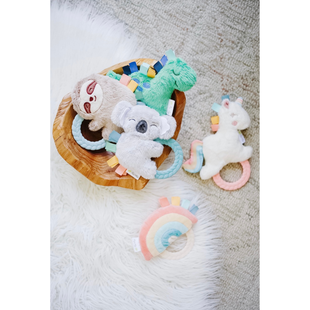 Itzy Ritzy - Ritzy Rattle Pal™ Plush Rattle Pal with Teether: Dino
